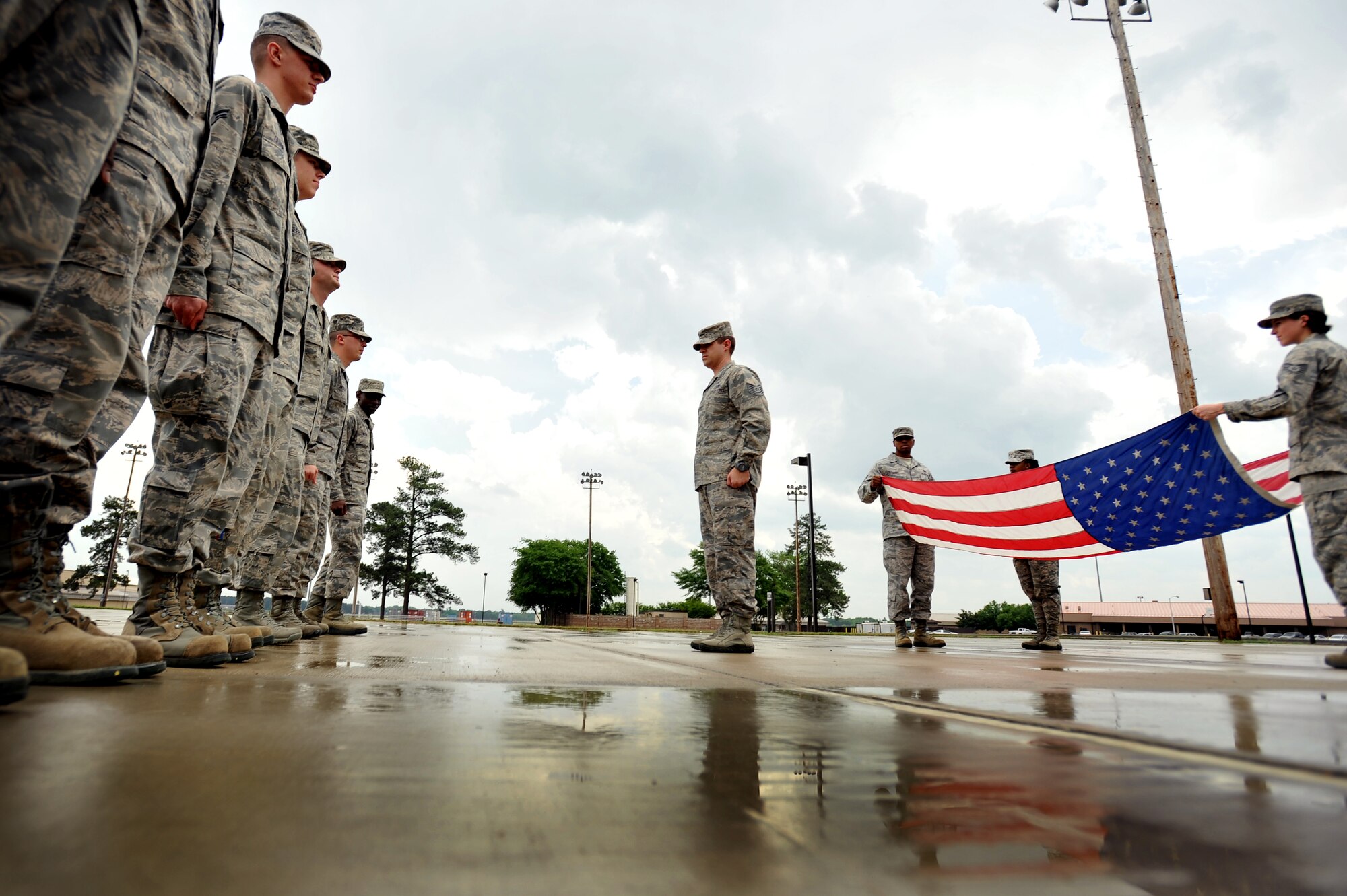 U.S. Air Force Tech Sgt. Shane Harvey, Airman Leadership School instructor, calls out commands to Airmen as they fall into formation prior to a retreat ceremony, March 5, 2012, Shaw Air Force Base, S.C. Harvey has been an ALS instructor for just over three years. His preferred teaching method is a balance between humor and firm instruction. (U.S. Air Force photo by Senior Airman Kenny Holston)




