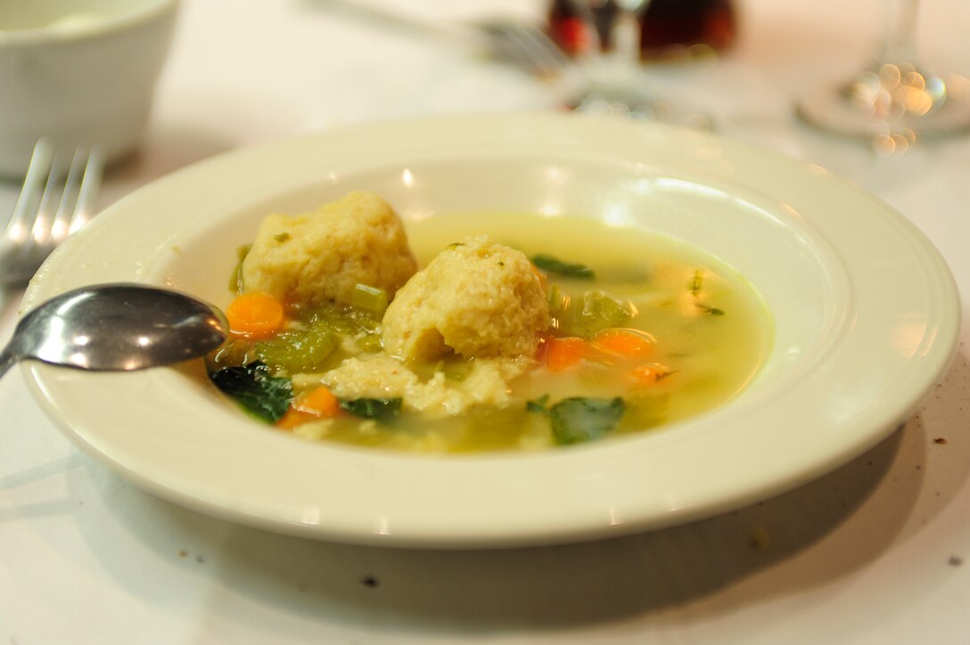 VANDENBERG AIR FORCE BASE, Calif.-- Matzah ball soup, a traditional dish, is served during a Passover Seder at the Pacific Coast Club here Friday, Apr. 6, 2012. The local Jewish community and Team V members came together to celebrate Passover. (U.S. Air Force photo/Staff Sgt. Andrew Satran)  