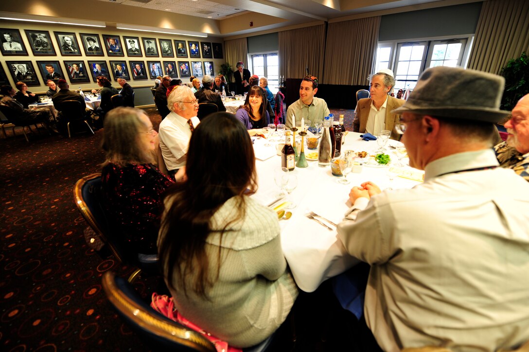 VANDENBERG AIR FORCE BASE, Calif.-- Team V members and local Jewish community members take part in a Passover Seder at the Pacific Coast Club here Friday, Apr. 6, 2012. A Seder consists of prayer readings and songs, ceremonial traditions and dining. (U.S. Air Force photo/Staff Sgt. Andrew Satran)  