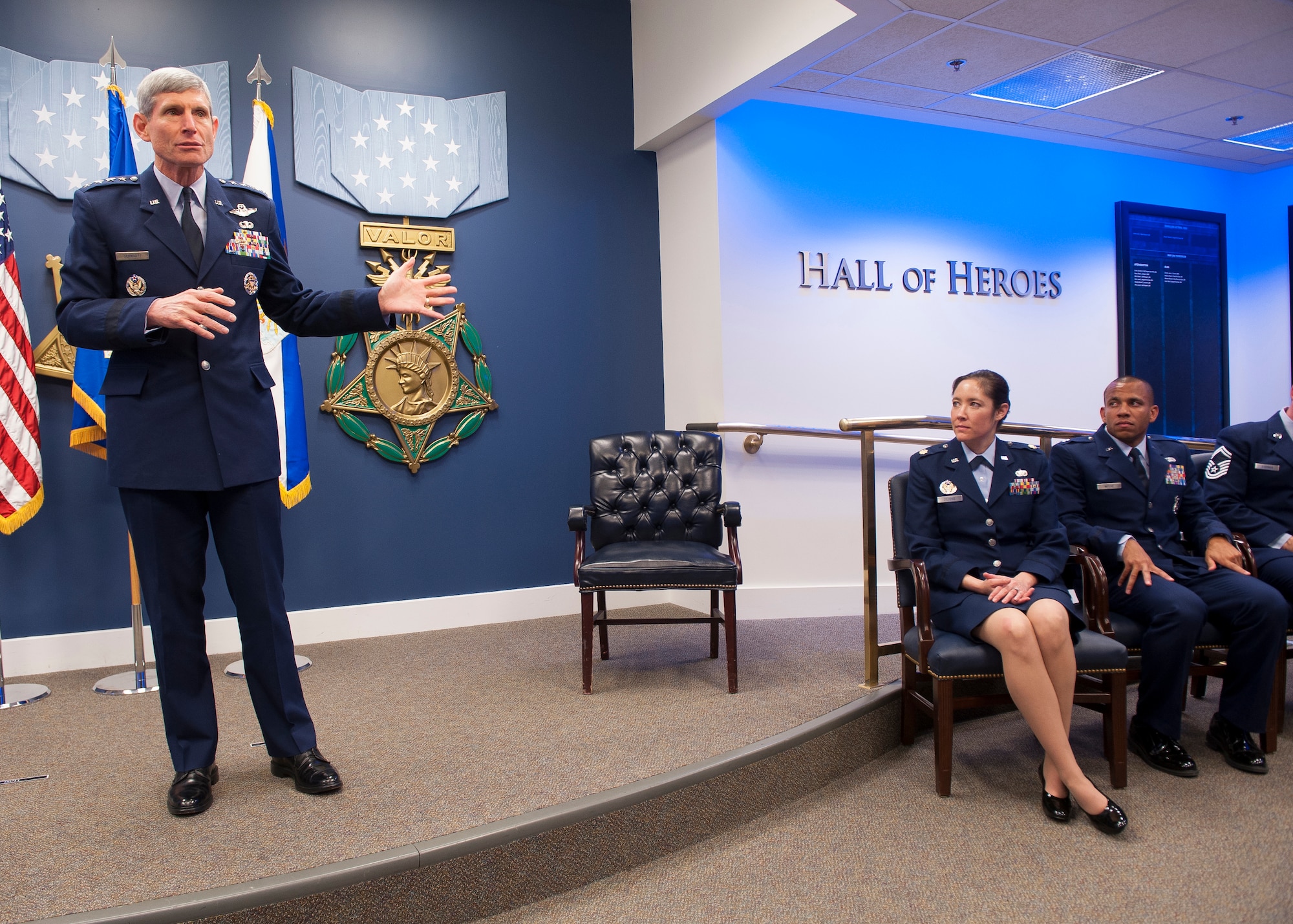 Air Force Chief of Staff Gen. Norton Schwartz (left) gives his remarks before presenting the Lance P. Sijan USAF Leadership Award to the 2011 recipients during a ceremony in the Pentagon's Hall of Heroes on April 6, 2012, Washington, D.C. Maj. Laura DeJong and Capt Gilbert Wyche II (pictured, left to right) joined Senior Master Sgt. Timothy Sterner and Tech. Sgt. Nathanael Hoag as the newest honorees.  The Sijan Award was
created in 1981 to recognize individuals who demonstrate the highest qualities of leadership both in and out of uniform. Sijan, was an Air Force Academy graduate. At the time of his death he was an Air Force Captain and fighter pilot. He was shot down during a mission in Vietnam and later died while being held in a prisoner of war camp. He was awarded the Congressional Medal of Honor posthumously.  (U.S. Air Force photo by Jim Varhegyi)
