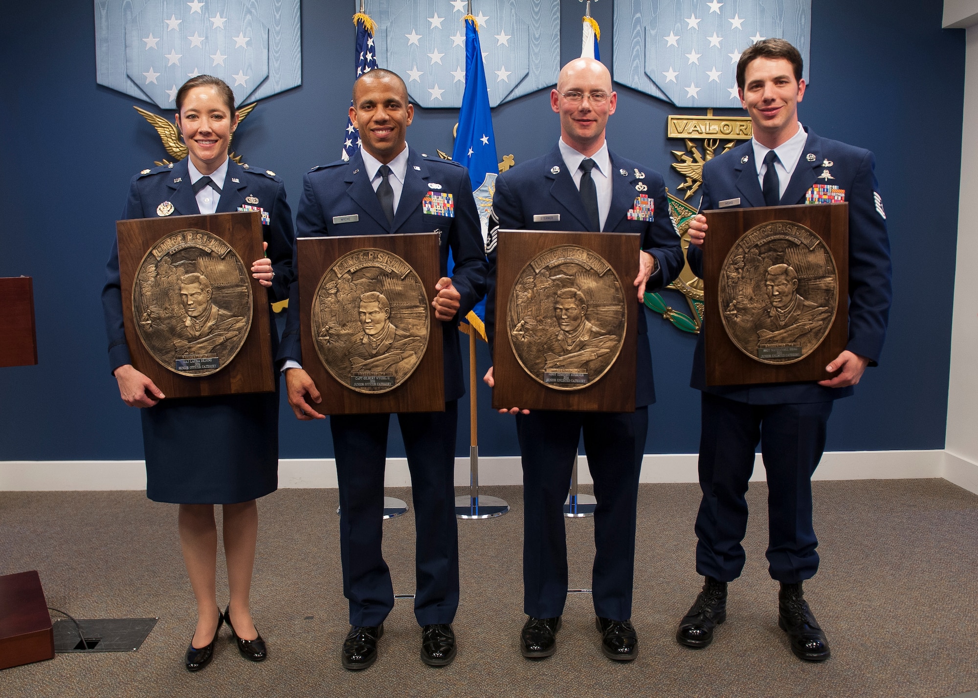 Chief of Staff Gen. Norton Schwartz  presented the Lance P. Sijan USAF Leadership Award to this year's recipients: (from left) Maj. Laura DeJong, Capt Gilbert Wyche II, Senior Master Sgt. Timothy Sterner and Tech. Sgt. Nathanael Hoag, during a ceremony in the Pentagon's Hall of Heroes on April 6, 2012, Washington, D.C. The Sijan Award was created in 1981 to recognize individuals who demonstrate the highest qualities of leadership both in and out of uniform. Sijan, was an Air Force Academy graduate. At the time of his death he was an Air Force Captain and fighter pilot. He was shot down during a mission in Vietnam and later died while being held in a prisoner of war camp. He was awarded the Congressional Medal of Honor posthumously.  (U.S. Air Force photo by Jim Varhegyi)