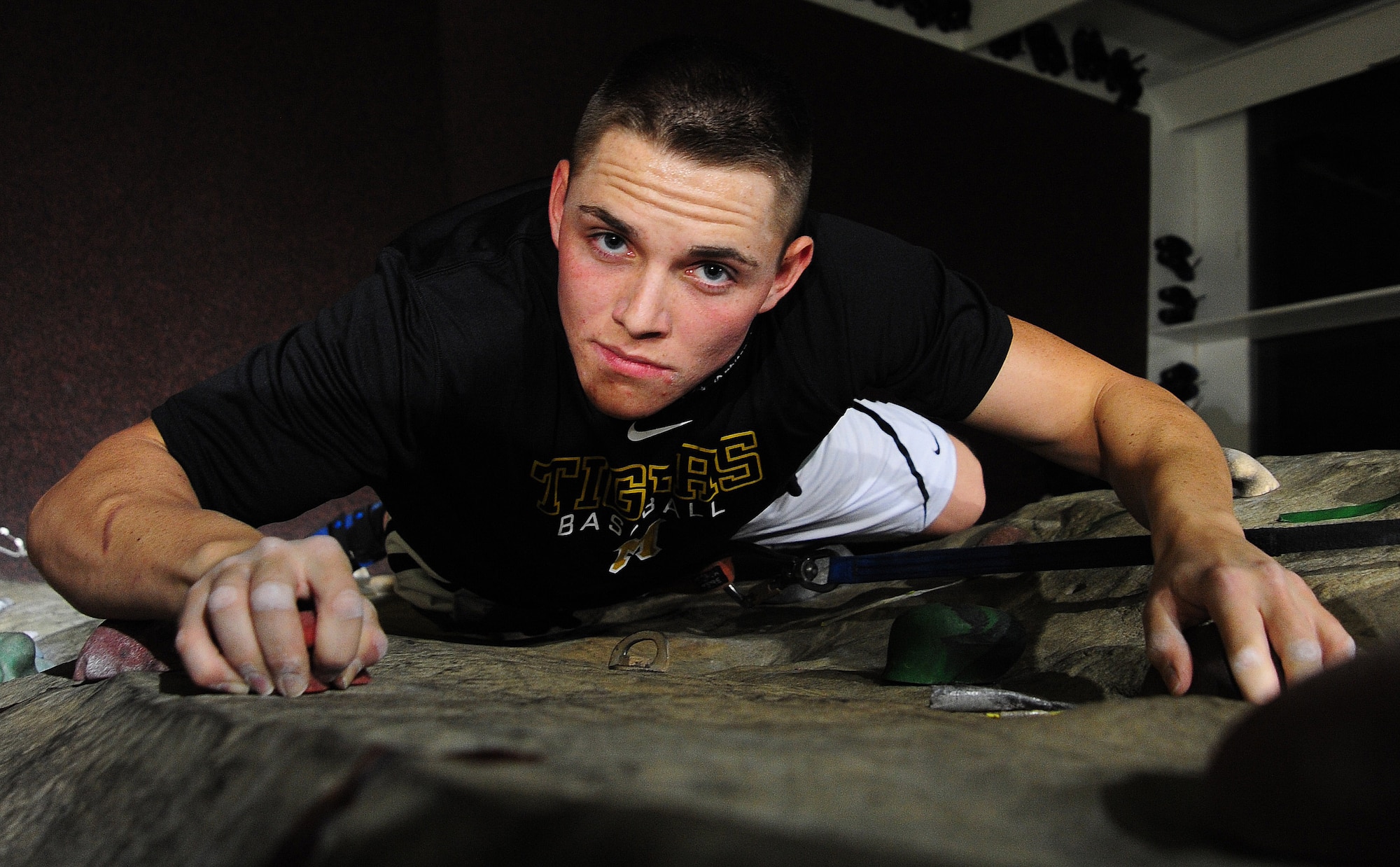 WARRENSBURG, Mo. -- Airman 1st Class Jason Ingalls, 131st Aircraft Maintenance Squadron aircraft armament systems apprentice, climbs a rock wall during a “Late Night at UCM” event at the University of Central Missouri in the recreation center March 16. The overall mission and vision of Wing It is to not only reduce underage drinking, but also build a community of Airmen and students who participate in alcohol-free events and assist the local community through volunteering and event planning. (U.S. Air Force photo/Senior Airman Nick Wilson)