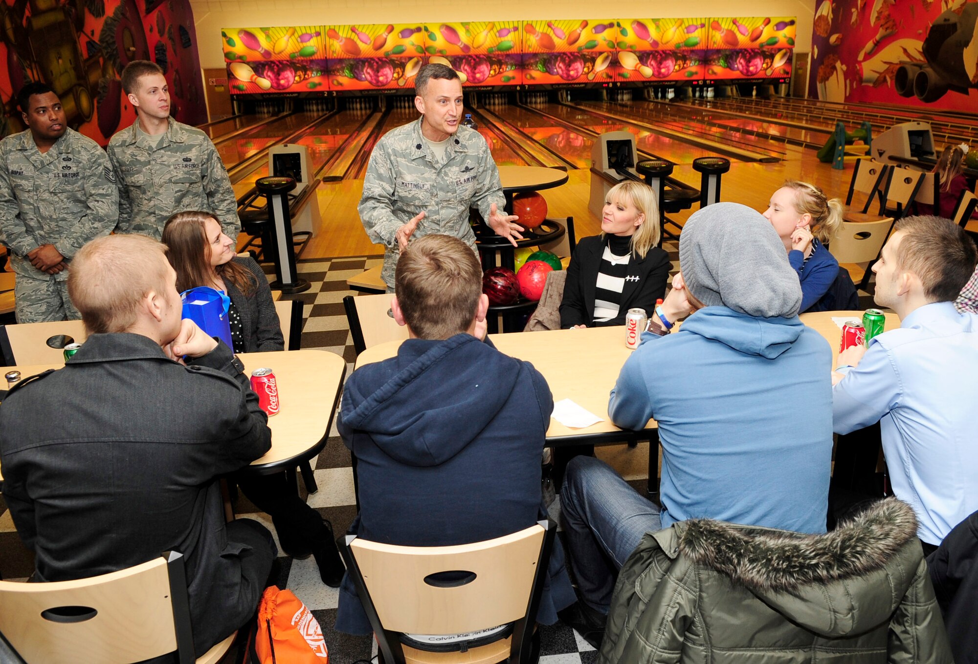 RAF MILDENHALL, England – Lt. Col. Wayne Mattingly, 100th Communications Squadron commander, expresses his excitement at having the Teenage Cancer Trust members visit the base here April 4, 2012. The tour, hosted by the 100th CS, was held for the group so that they could visit several base facilities including the fire department, air traffic control tower and the 100th maintenance squadron. (U.S. Air Force photo/Senior Airman Ethan Morgan)