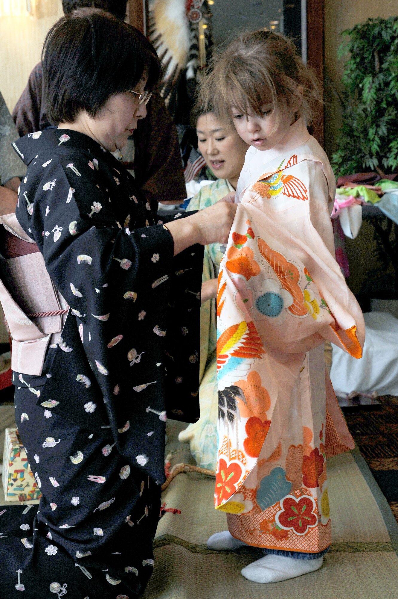 The daughter of U.S. Air Force Staff Sgt. Renee Bates, 35th Medical Support Squadron, gets fitted for a kimono during the 25th Annual Japan Day at Misawa Air Base, Japan, April 7, 2012. Japan Day represents an unique opportunity for Misawa residents to experience Japanese culture. (U.S. Air Force photo by Tech. Sgt. Marie Brown/Released)
