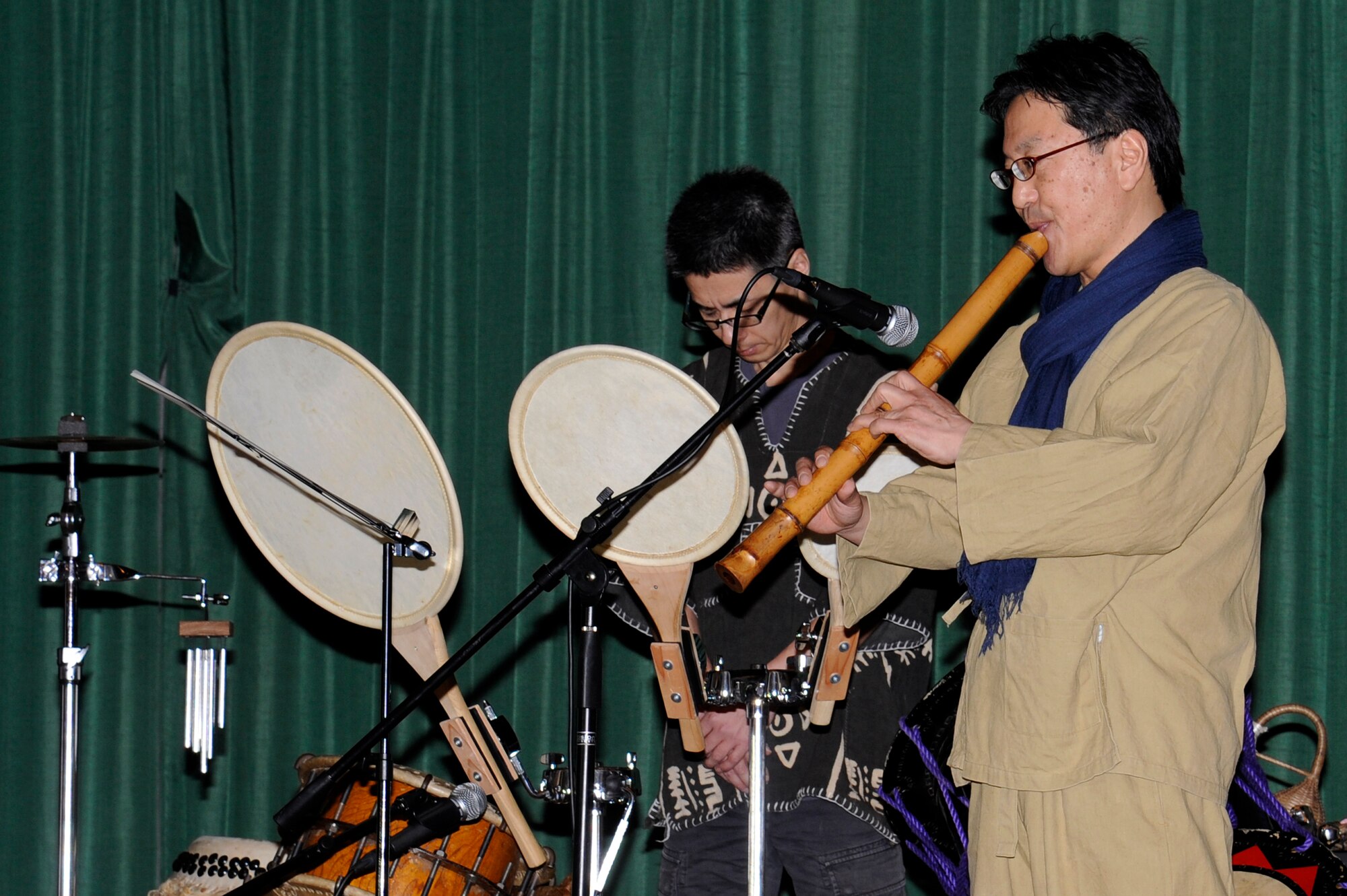 Mr. Masato Okubo performs his rendition of the Japanese and American National Anthems on the flute during the 25th Annual Japan Day opening ceremony at Misawa Air Base, Japan, April 7, 2012. Japan Day was an opportunity for Misawa residents and their families to immerse themselves in various aspects of the Japanese culture. (U.S. Air Force photo by Tech. Sgt. Marie Brown/Released)