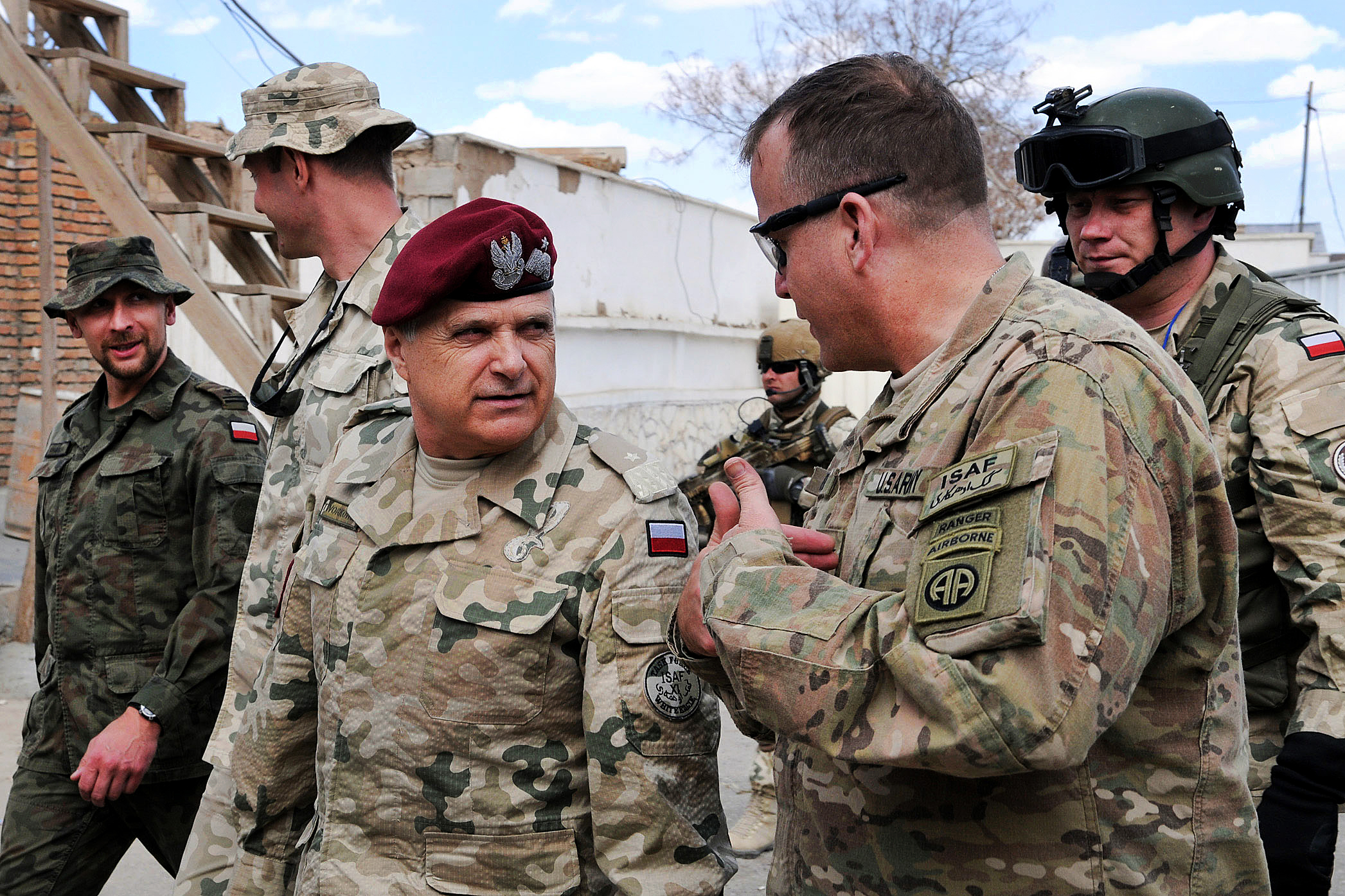U.S. Army Col. Mark L. Stock speaks with Polish Brig. Gen