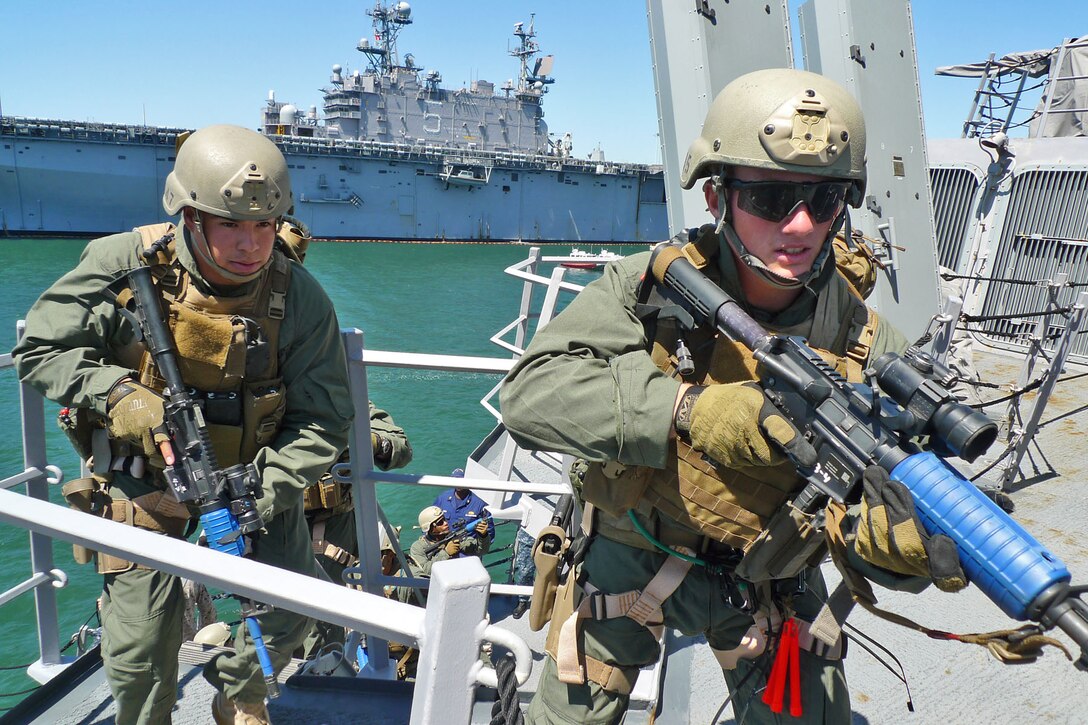 Marines from the 15th Marine Expeditionary Unit’s Maritime Raid Force conduct a visit, board, search and seizure exercise aboard the USS Dewey at Naval Base San Diego, April 9. The MRF’s primary role is to carry out raids against Maritime objectives including oil platforms, ships, and targets on shore and is based around the MEU’s Force Reconnaissance platoon and supported by a security and headquarters element. (U.S. Marine Corps photo by Lance Cpl. Timothy Childers)