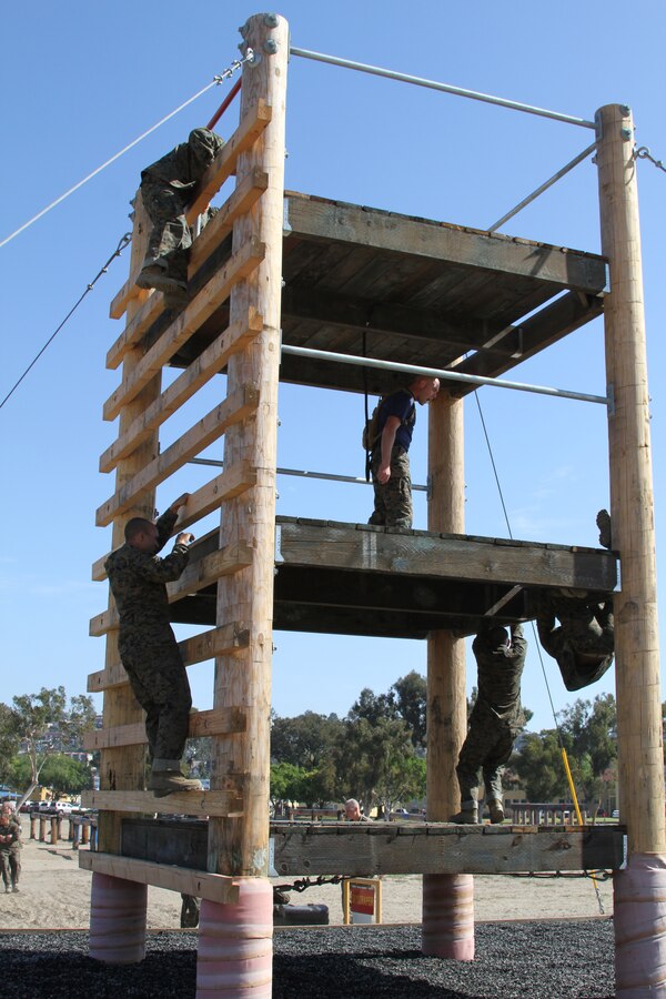 Recruits overcome any fear of heights by climbing obstacles on the confidence course aboard Marine Corps Recruit Depot San Diego April 9. The obstacles help recruits see what they are able to accomplish by using teamwork and having confidence in themselves and fellow recruits.