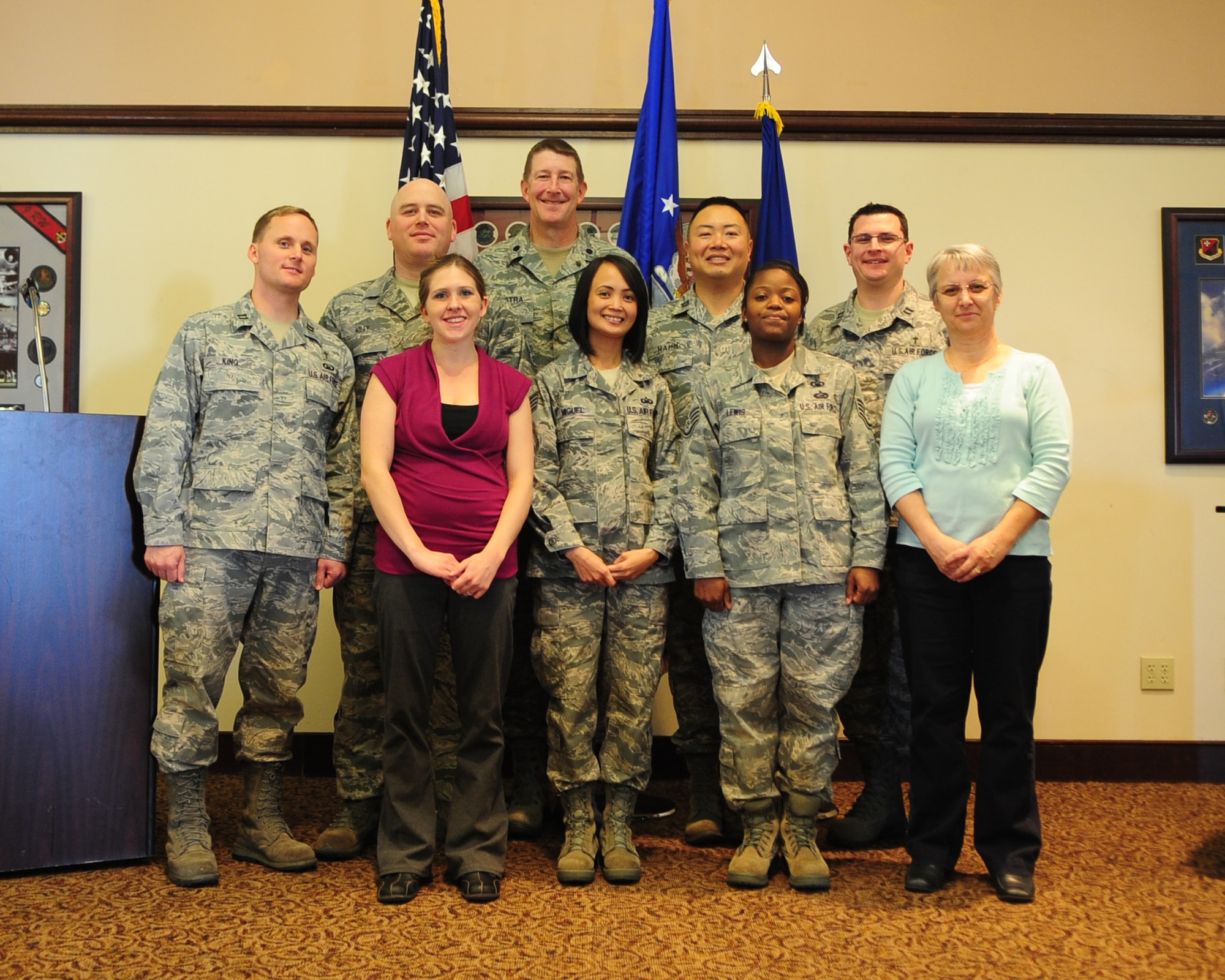 The Beale Air Force Base chapel staff poses for a group photo Feb. 16 after the National Prayer luncheon at the Recce Point Club. Beale was named the 2011 Air Force Medium Chapel of the year after winning the award at the Air Combat Command level. (U.S. Air Force photo by Senior Airman Shawn Nickel)