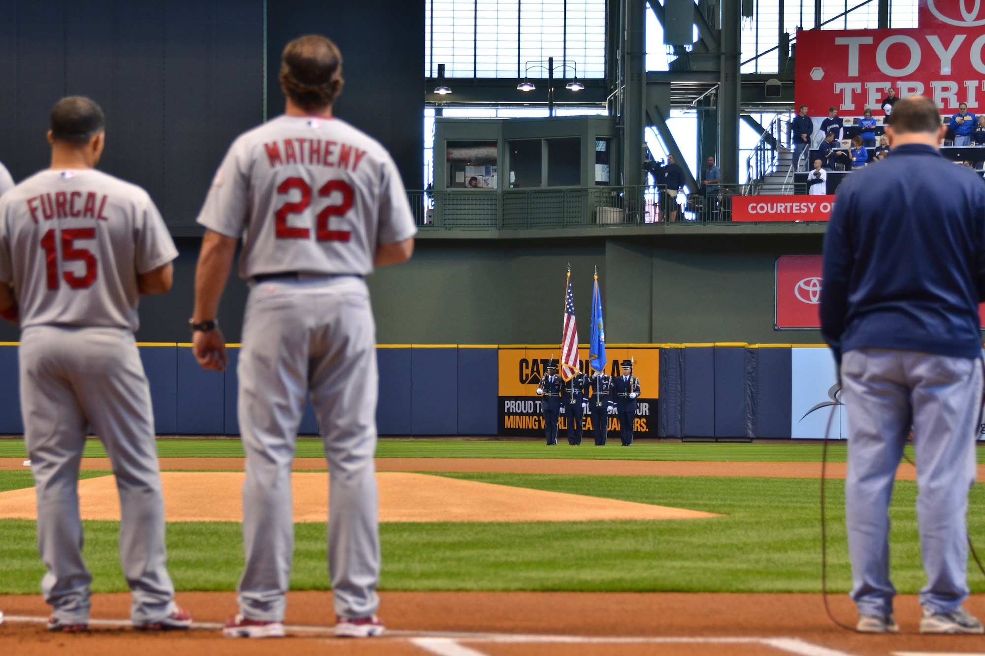 Members of the 128th Air Refueling Wing’s Honor Guard present the colors during the National Anthem during pre-game festivities just before the Milwaukee Brewers’ Opening Day game vs. the World Series Champion St. Louis Cardinals at Miller Park in Milwaukee Friday, April 6, 2012. The 128th's Honor Guard is a regular participant in many community events in the Milwaukee area.(U.S. Air Force Photo by: Senior Master Sgt. Jeffrey A. Rohloff) (Released)