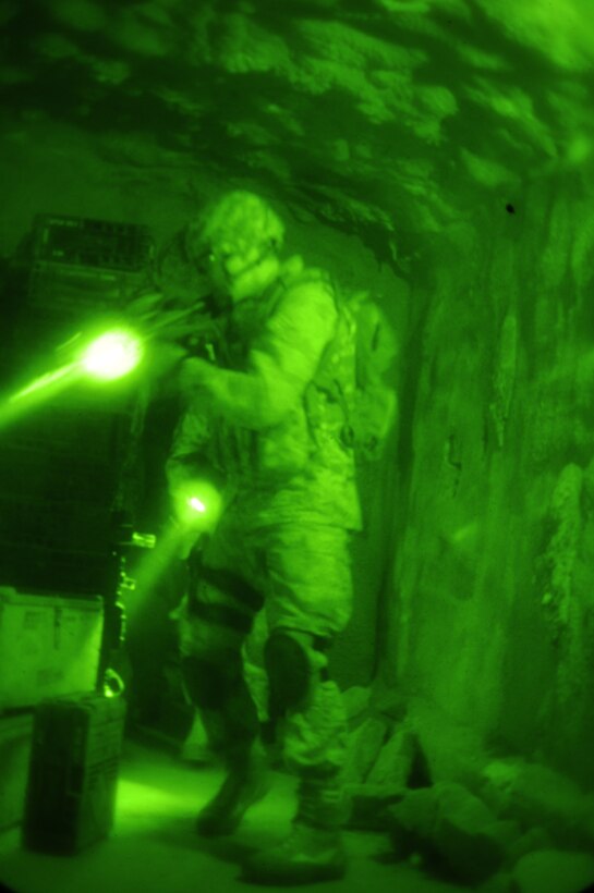 SrA Scott Pope clears a cache in the tunnel at Operation Purple Rain.