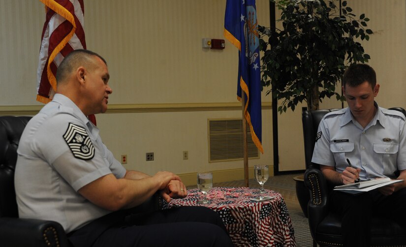 Chief Master Sergeant of the Air Force James Roy answers questions during an interview by Senior Airman Ian Hoachlander at Joint Base Charleston - Air Base April 9. Roy is the 16th Chief Master Sgt. of the Air Force and represents the highest enlisted level of leadership. Hoachlander is from the 628th Air Base Wing Public Affairs office. (U.S. Air Force photo / Airman 1st Class Ashlee Galloway)
