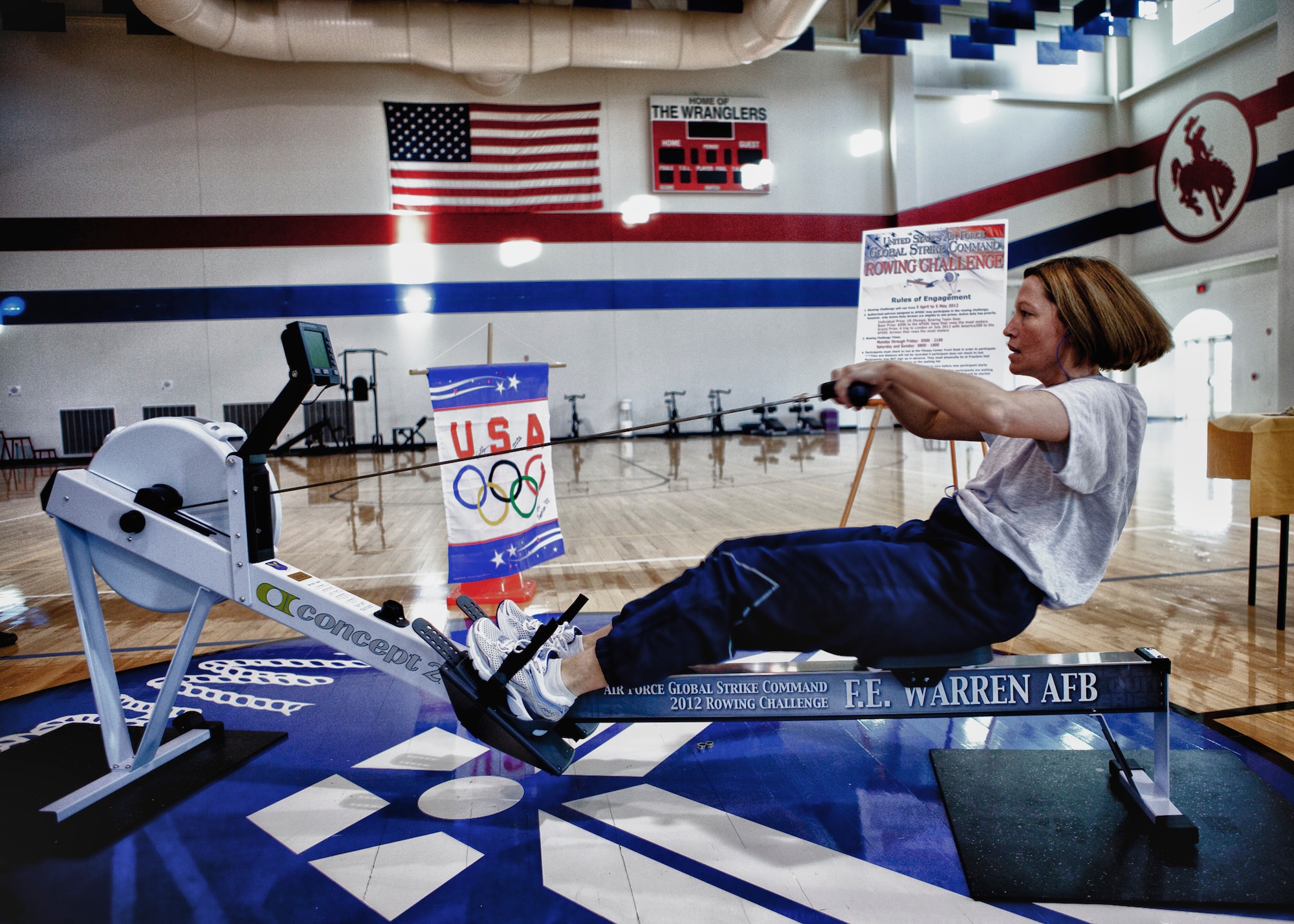 Master Sgt. Audrey Hasert, 153rd Command and Control Squadron, uses the Erg machine during the American300 Air Force Global Strike Command rowing challenge kickoff event in the base gym April 5. (U.S. Air Force photo by Matt Bilden)