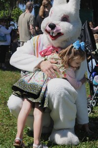 CHARLESTON, S.C. (April 7, 2012) Two-year-old Ellison Wolf gives the Easter Bunny a hug at the Easter Egg Hunt and Month of the Military Child Festival at Marrington Plantation at Joint Base Charleston – Weapons Station April 7. Hundreds of Air Force and Navy service members and their families, along with Department of Defense employees, retirees and Reserve members joined in the festivities which featured food to choose from, games, a bouncy castle, face painting and raffle prizes. (U.S. Navy photo/Petty Officer 1st Class Jennifer Hudson)