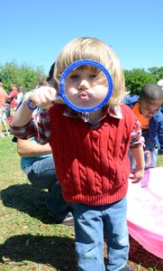 CHARLESTON, S.C. (April 7, 2012) - Two-year-old Eli Brading attempts to blow a bubble as big as his head while playing at the bubble pool during the Easter Egg Hunt and Month of the Military Child Festival held at Marrington Plantation at Joint Base Charleston-Weapons Station April 7. The event was open to service members, Department of Defense personnel and their families and provided games, food and fun for the whole family. Eli is the son of Airman 1st Class Tom Brading, 628th Air Base Wing Public Affairs Specialist. (U.S. Air Force Photo / Airman 1st Class Tom Brading)