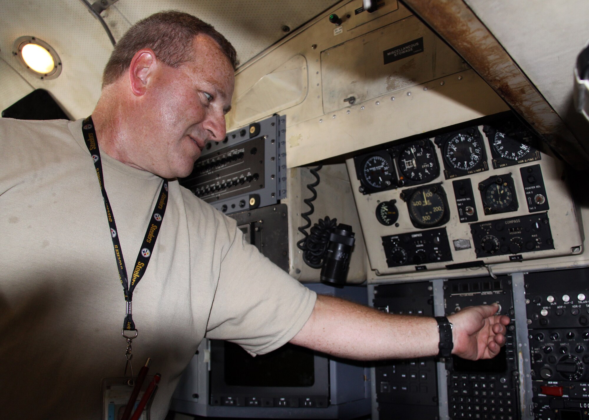 Tech. Sgt. Matt Reusser, a 911th Airlift Wing crew chief, powers down aircraft communications just before sealing the 'Alert Bird' on April 9, 2012, in support of 'Coronet Oak' operations based in Muniz, Puerto Rico. Reusser has served on nine different 'Coronet Oak' rotations throughout his career. He and several other unit members entered their second week of duty over the Easter weekend, all serving at the current location. (U.S. Air Force photo by Capt. Shawn M. Walleck/Released)