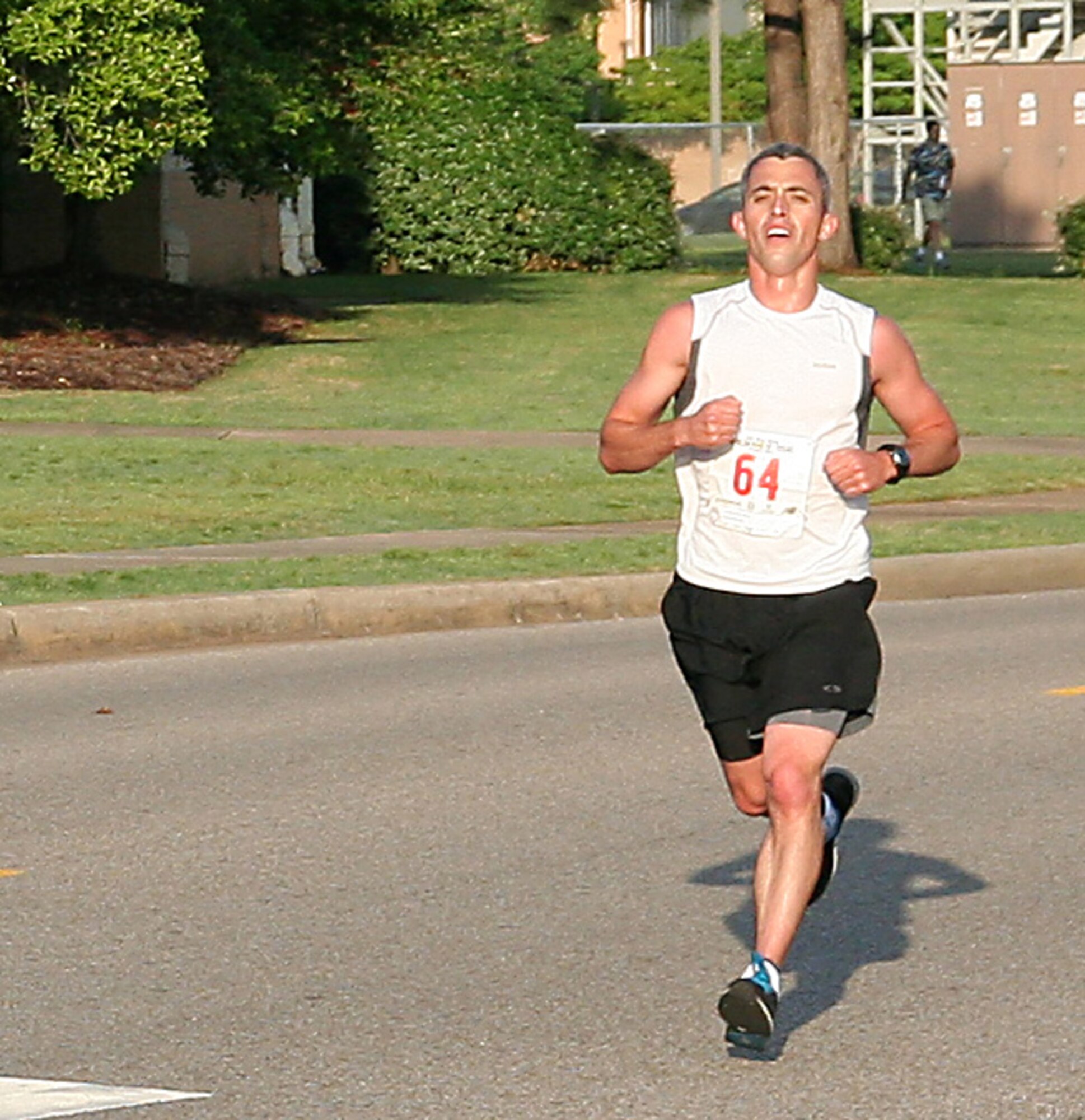 A participant nears the half-way point of the Heritage of Air Power Kenney 15K race, here, April 6. (Photo by Kelly Deichert)