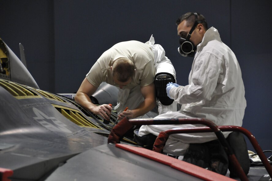 The 162nd Fighter Wing at Tucson International Airport earned high marks on an ESOHCAMP assessment conducted April 3-5. The wing's Environmental, Safety & Occupational Health Compliance Assessment & Management Program was deemed "successful" by the Air National Guard at following law, regulation and policy. Most importantly, the assessment results mean that the unit is effective at protecting its workers and the environment. (U.S. Air Force photo/Tech. Sgt. Hollie Hansen)
