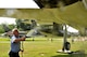 Alan Johns, 42nd Operations Support Flight contractor, washes pollen from a F-105D Thunderchief static display at Maxwell Air Force Base, Ala., April 4. Contractors from the 42nd OSF wash the 12 static displays on Maxwell and Gunter Annex twice a year to enhance the appearnce and prevent corrosion from forming on some of the nearly 20 year old displays. (U.S. Air Force photo by Master Sgt. Michael Voss)