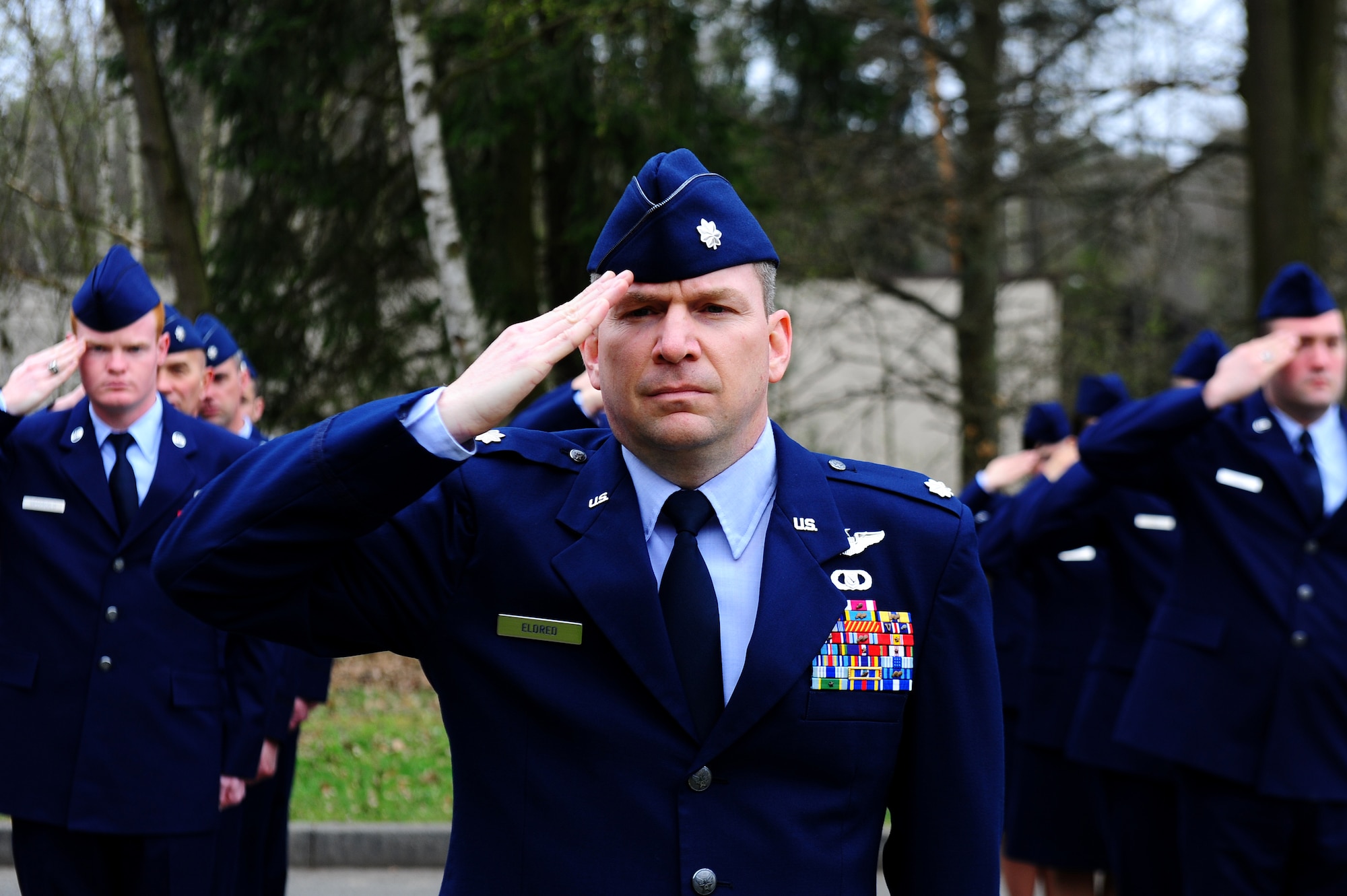 Air Force members from the 76th Airlift Squadron salute during a memorial ceremony on Ramstein Air Base, Germany, April 5, 2012. On April 3, 1996, a CT-43 aircraft that was assigned to the 76th AS crashed outside of Dubrovnik Croatia during a peacekeeping mission. The squadron honored the six crew members of flight IFO-21 this year marking the 16th anniversary. (U.S. Air Force photo by Amn Brea Miller)