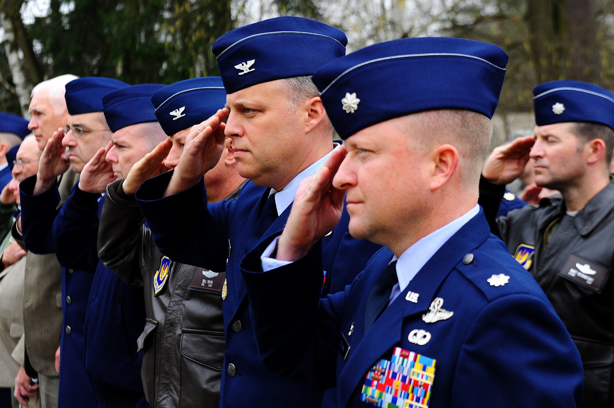 Ramstein leaders salute during a memorial ceremony on Ramstein Air Base, Germany, April 5, 2012. On April 3, 1996, a CT-43 aircraft that was assigned to the 76th Airlift Squadron crashed outside of Dubrovnik Croatia during a peacekeeping mission. The squadron honored the six crew members of flight IFO-21 this year marking the 16th anniversary. (U.S. Air Force photo by Amn Brea Miller)