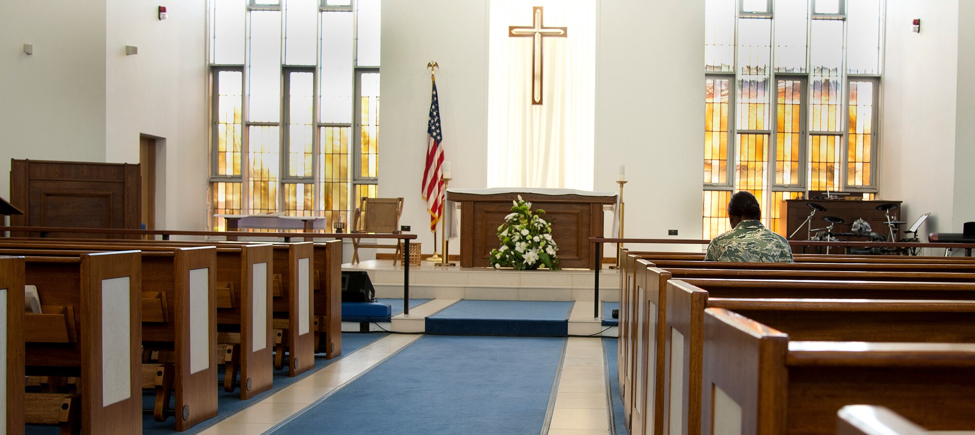 RAF MILDENHALL, England – An Air Force senior airman prays and recalls the challenges she’s endured at the base chapel here April 10, 2012. The Airman is a rape survivor and is paving the path forward in life and in her career. She continues to dedicate much of her time to her faith and now is also devoted to helping those who may have suffered the way she did, sexual assault victims, she said. (U.S. Air Force photo/Master Sgt. Kevin Wallace)