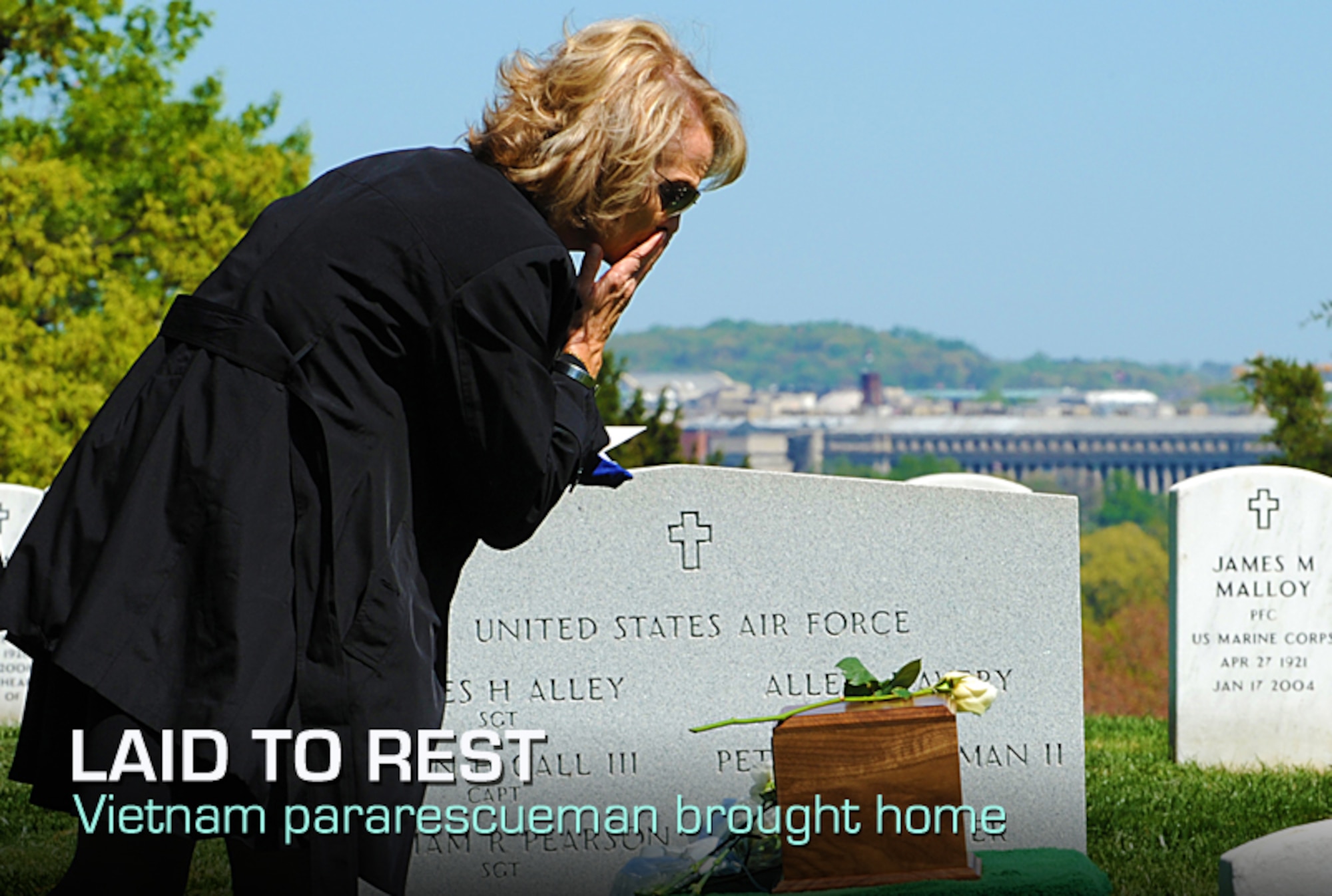 Debbie McBride blows one last kiss to her father, Tech. Sgt. Allen Avery during his burial April 6, 2012, at Arlington National Cemetery in Arlington, Va. Avery was a pararescueman who, along with five others, was killed during a recovery operation in Vietnam on April 6, 1972. Avery's remains were recently identified via new DNA techniques and returned to the U.S. He was laid to rest with full military honors along with his fellow crew members who were interred in 1997. (U.S. Air Force photo/Master Sgt. Raheem Moore)
