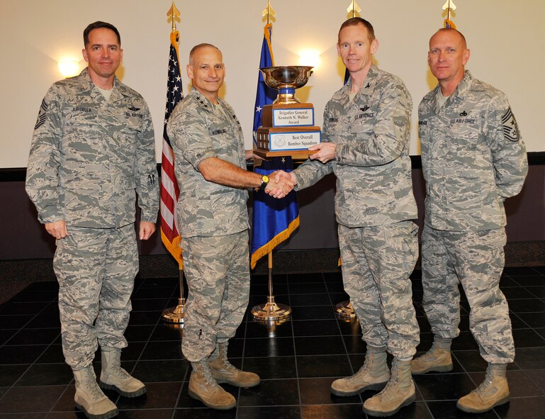 BARKSDALE AIR FORCE BASE, La. -- Team Minot’s 23rd Bomb Squadron was recently awarded the Brigadier General Kenneth N. Walker award, earning the title of the best overall bomber squadron in the command. Members of the 23rd Bomb Squadron along with other 5th Bomb Wing personnel recently returned here from deployment to Guam. The members were there as part of U.S. Pacific Command's Continuous Bomber Presence mission, where they completed 1200 flight hours and 186 sorties. Air Force Global Strike Command also recognized the 5th BW for earning the outstanding bomb wing award. (U.S. Air Force photo/Staff Sgt. Chad Warren) 