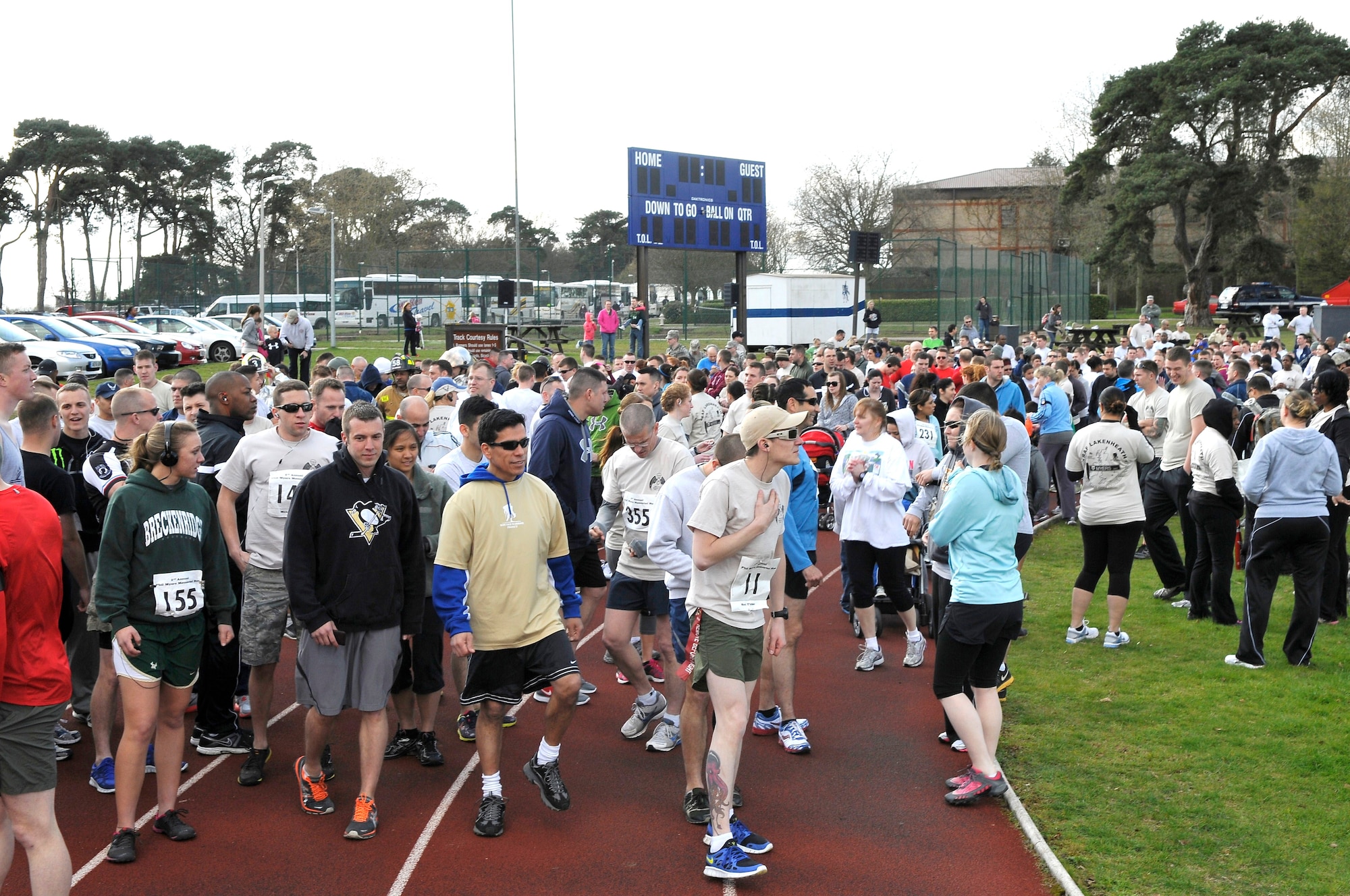 ROYAL AIR FORCE LAKENHEATH, England - Members of the 48th Fighter Wing and their families prepare to start the second annual Phil Myers Memorial Run at the RAF Lakenheath running track April 5, 2012.  Myers was a member of the 48th Civil Engineer Squadron explosive ordnance disposal flight who died as a result of an improvised explosive device attack while deployed to Afghanistan in 2009.  The 5K run/walk began at the track and ended at the Phil Myers Memorial on Myers Way.  All donations from the event will go to the EOD Memorial Foundation and the Wounded Warrior Project.  (U.S. Air Force photo by Staff Sgt. Connor Estes)