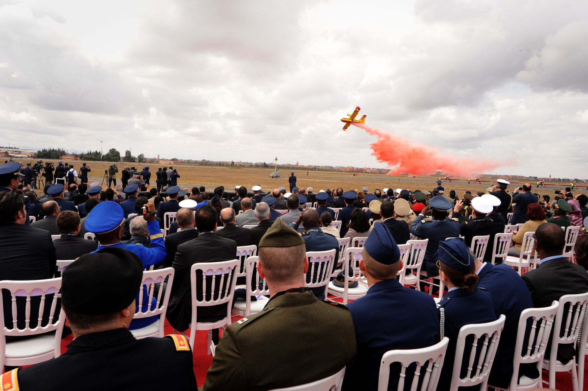 MARRAKECH, Morocco – A Royal Moroccan Air Force CL-415 performs for a crowd during the opening ceremonies at the Marrakech Aeroexpo April 4, 2012. U.S. Air Forces Africa is participating the third biennial Aeroexpo Marrakech to strengthen the partnerships with the nations involved and show commitment to security and stability in the region. (U.S. Air Force photo/Staff Sgt. Benjamin Wilson)