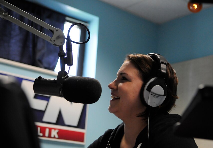 Staff Sgt. Natalie Anderson, AFN Incirlik, shares information about the Air Force Assistance Fund Telethon April 5, 2012, in the AFN-I radio studio at Incirlik Air Base, Turkey. The telethon involved an auction of goods and services from local vendors, as well as faux arrests and bail bonds, which raised more than $6,000 for the AFAF in 12 hours. (U.S. Air Force photo by Staff Sgt. Kali L. Gradishar/Released)