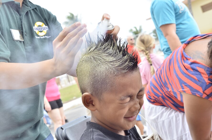 Andersen children participate in the "EASTER EGGS-TRAVAGANZA" activities
April 7 at the Andersen Youth Center field.  More than 5,000 candy-filled
eggs were hidden for the children to find.  There were also other springtime
activities such as face painting, caribou riding, games and various booths
and demonstrations for all ages to enjoy.  (U.S. Air Force photo by Staff
Sgt. Alexandre Montes)  
