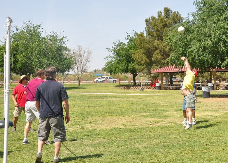 Members of the U.S. Army Corps of Engineers Los Angeles District team and their families enjoy a round of volleyball during the 2012 Engineer Day Celebration held in Phoenix at the McCormick-Stillman Railroad Park April 6. The Arizona-Nevada Area Office holds the celebration earlier than the official June timeframe in order to allow for more participation before the Arizona summer time. 