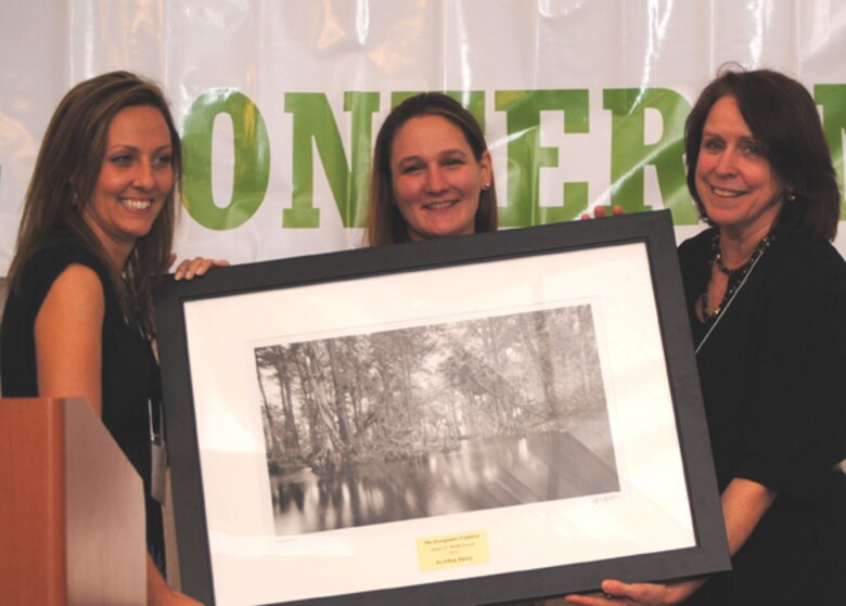 Jo-Ellen Darcy, Assistant Secretary of the Army for Civil Works (right) received the James D. Webb Award at the Everglades Coalition Conference Jan. 7, 2012. Julie Hill-Gabriel (center), State Everglades Coalition Co-Chair, presented the award along with Dawn Shirreffs (left), National Everglades Coalition Co-Chair. 