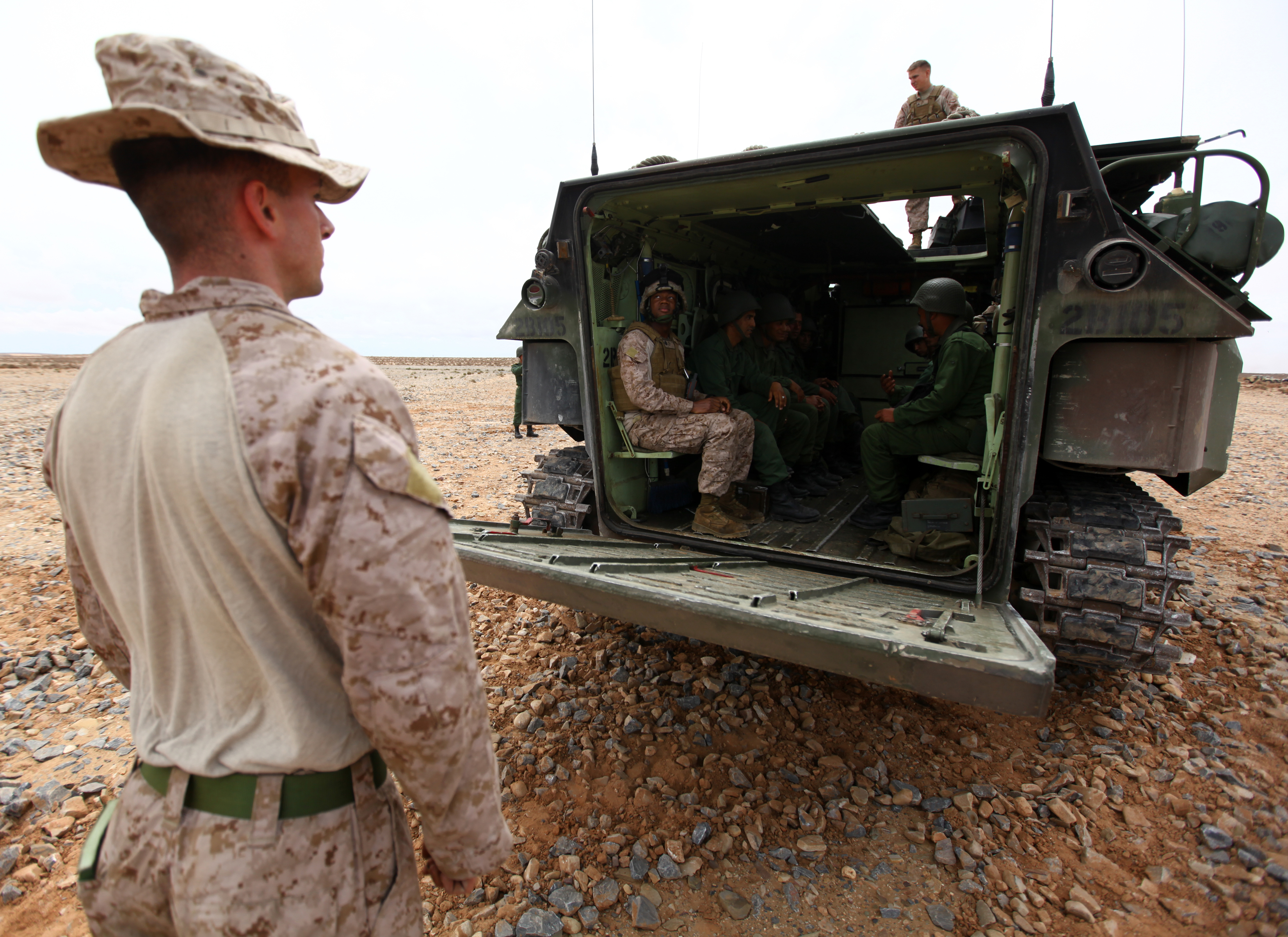 Marines from the 24th Marine Expeditionary Unit partnered with members of the Royal Moroccan Armed Forces April 10, 2012, on the shores of Morocco to explain the unique capabilities of the assault amphibious vehicle during Exercise African Lion 12. The 24th MEU is participating in the exercise to continue to build on relationships between the U.S. and Moroccan forces and learn about each other's militaries. This exercise is the first deployment event for the 24th MEU and Iwo Jima Amphibious Ready Group, which deployed in March on a regularly scheduled deployment to serve as a theater reserve and crisis response force.