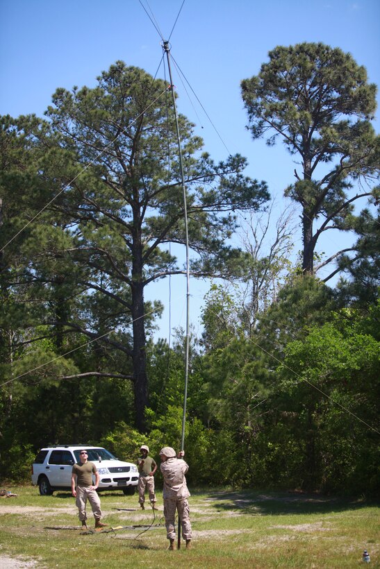 Marines with Landing Support Company, Combat Logistics Regiment 27, 2nd Marine Logistics Group set up a communication antenna during a field exercise at Landing Zone Kite aboard Camp Lejeune, N.C., April 11, 2012. The purpose of the exercise was to give the company’s Marines a chance to sharpen their knowledge of their military occupational specialty.