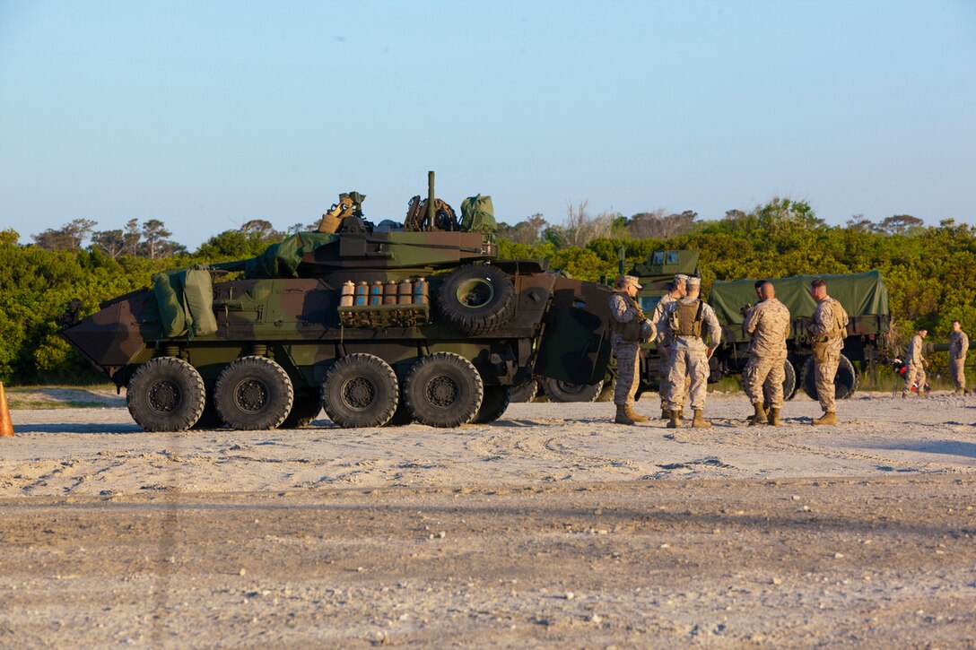 Marines with 26th Marine Expeditionary Unit prepare to embark an Amphibious Assault Vehicle on the shore of Onslow Beach, N.C., April 11, 2012. The 26th MEU is currently providing support to the Commemoration of the Battle of New Orleans. Starting this April and continuing through 2015, the U.S. Navy, U.S. Marine Corps and U.S. Coast Guard will commemorate the Bicentennial of the War of 1812 and the Star Spangled Banner. The War of 1812 celebration will Commemorate the rich Naval history and showcase the capabilities of today's Navy-Marine Corps team. (U.S. Marine Corps photo by Cpl. Christopher Q. Stone/Released)