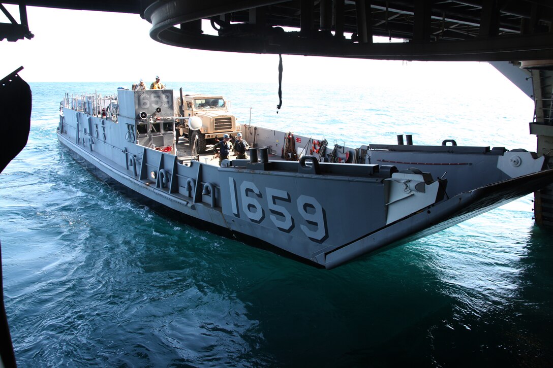 A Navy Landing Craft, Utility departs for Onslow Beach, N.C. from USS Wasp, which is off the coast, April 11, 2012.The 26th Marine Expeditionary Unit is under way to support the commemoration of the Battle of New Orleans. Starting this April and continuing through 2015, the US Navy, US Marine Corps and US Coast Guard will commemorate the War of 1812 and the Star Spangled Banner. The War of 1812 celebration will commemorate the rich naval history and showcase the capabilities of todays Navy-Marine Corps Team.