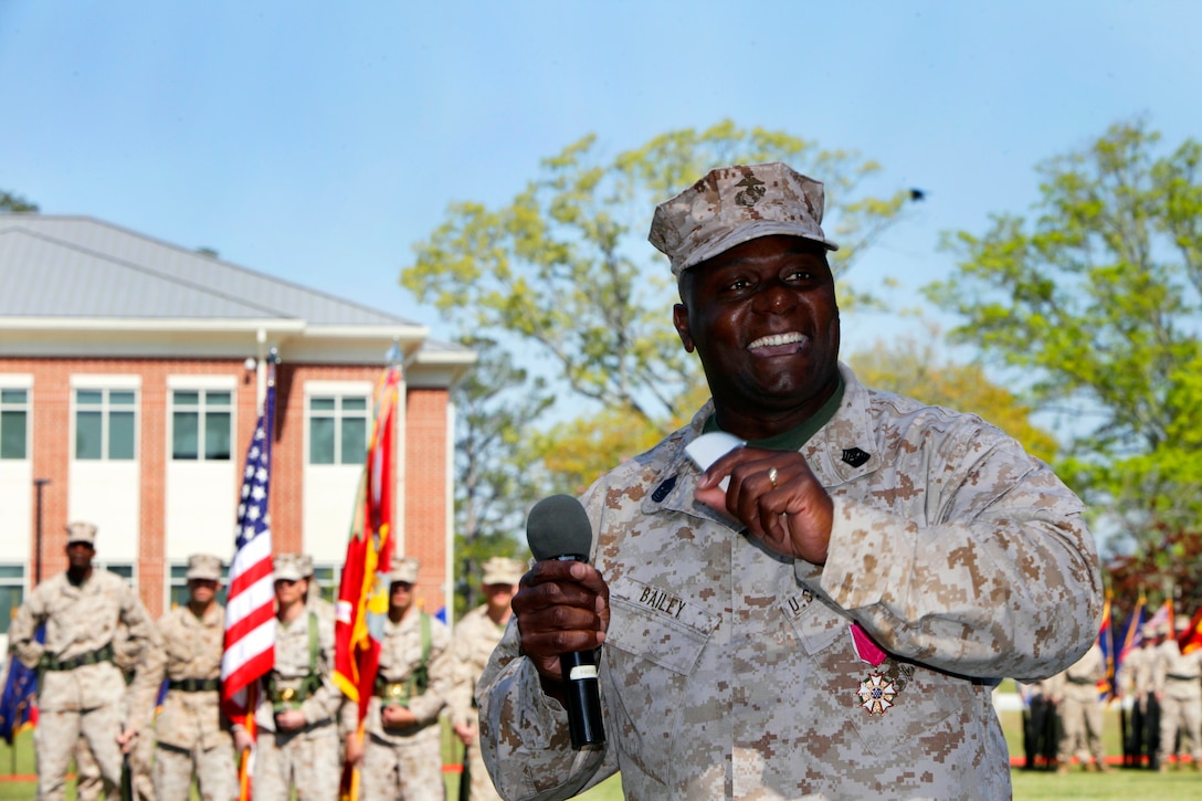 Sgt. Maj. Jerry L. Bailey speaks to family and guests after  relinquishing his final duties as sergeant major of Marine Corps Air Station Cherry Point to Sgt. Maj. Angela M. Maness, during a relief and appointment ceremony on the air station parade deck, April 11. The ceremony included Bailey’s retirement from the Marine Corps as well.