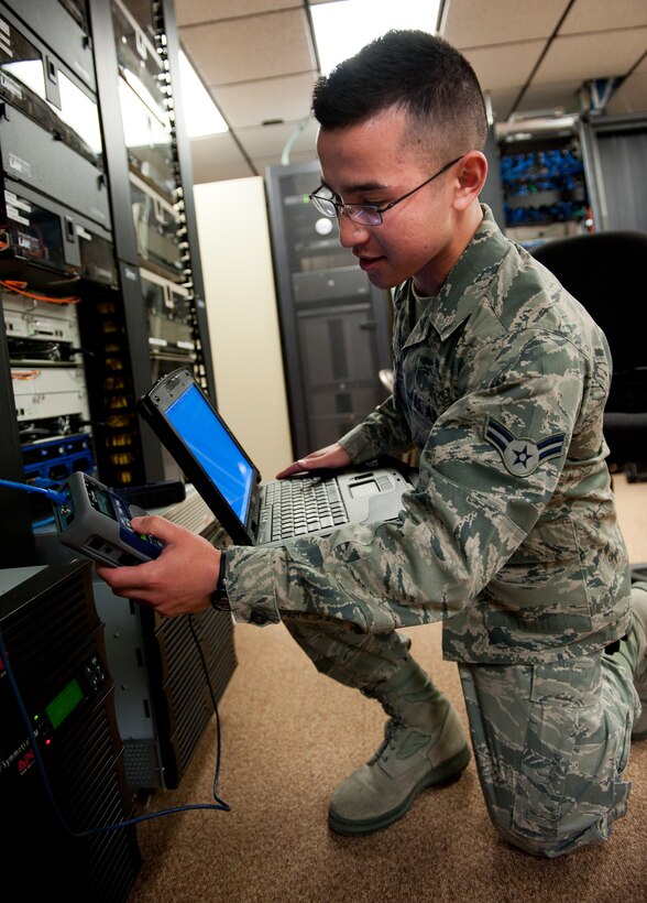 Airman 1st Class Micah Schrotberger, 28th Communications Squadron cyber transport technician, troubleshoots an information transfer node port at Ellsworth Air Force Base, S.D., April 4, 2012. This network allows the cyber transport technicians to access customer computer accounts remotely to quickly resolve issues. (U.S. Air Force photo by Airman 1st Class Kate Thornton/Released) 