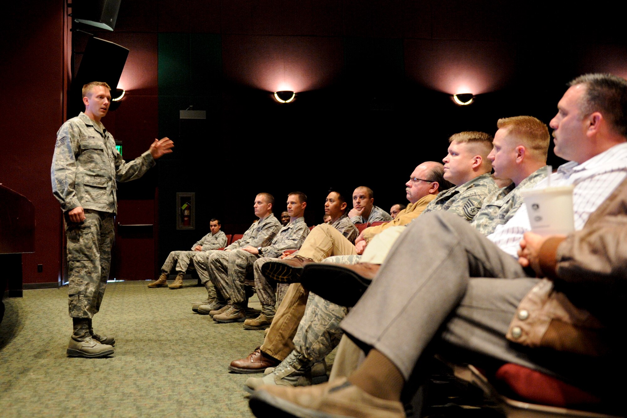 VANDENBERG AIR FORCE BASE, Calif.-- Staff Sgt. Robert Behm, Jr., assigned to the 43rd Aircraft Maintenance Squadron at Pope Air Force Base, N.C., talks about getting charged with driving under the influence and how his life has changed at a briefing at the base theater here Wednesday, April 11, 2012. Behm is part of the Airman-to-Airman Safety Advisory Council, which uses the experiences of Airmen to communicate to their peers the consequences of their choices and help others avoid repeating the same mistakes. (U.S. Air Force photo/Staff Sgt. Levi Riendeau)