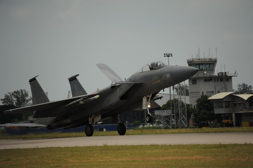 An F-15C from the 67th Fighter Squadron at Kadena Air Base, Japan, lands at TUDM Butterworth April 5, 2012, during Cope Taufan 2012. The F-15Cs are pitted against four different Royal Malaysian Air Force airframes during the live-flying exercise designed around dissimilar basic fighter maneuvers and dissimilar air combat tactics training. (U.S. Air Force photo/Master Sgt. Matt Summers)
