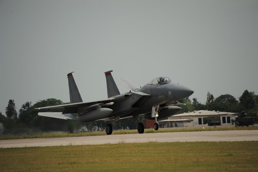 An F-15C from the 67th Fighter Squadron at Kadena Air Base, Japan, lands at TUDM Butterworth April 5, 2012, during Cope Taufan 2012. The F-15Cs are pitted against four different Royal Malaysian Air Force airframes during the live-flying exercise designed around dissimilar basic fighter maneuvers and dissimilar air combat tactics training. (U.S. Air Force photo/Master Sgt. Matt Summers)