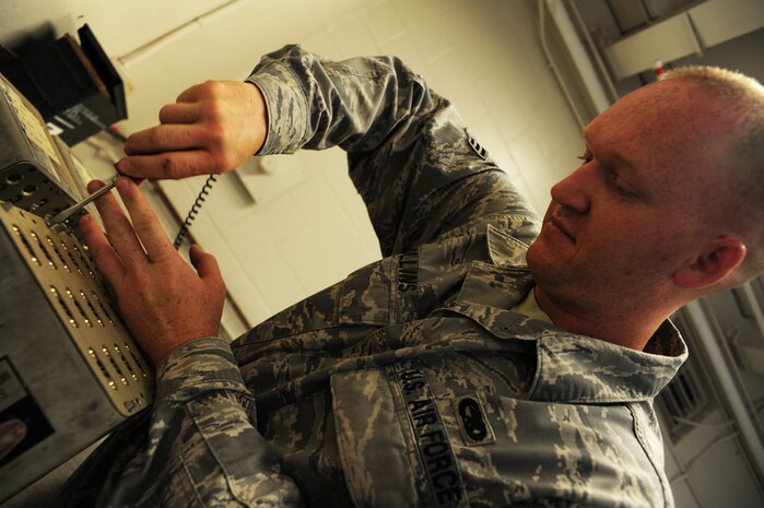 Senior Airman David Collins processes flares at the Joint Base Charleston - Air Base Munitions supply April 10. Flares are used on aircraft to deter incoming bombs. Collins is a munitions control technician with the 437th Maintenance Group Munitions office. (U.S. Air Force photo/Staff Sgt. Katie Gieratz) (Released)