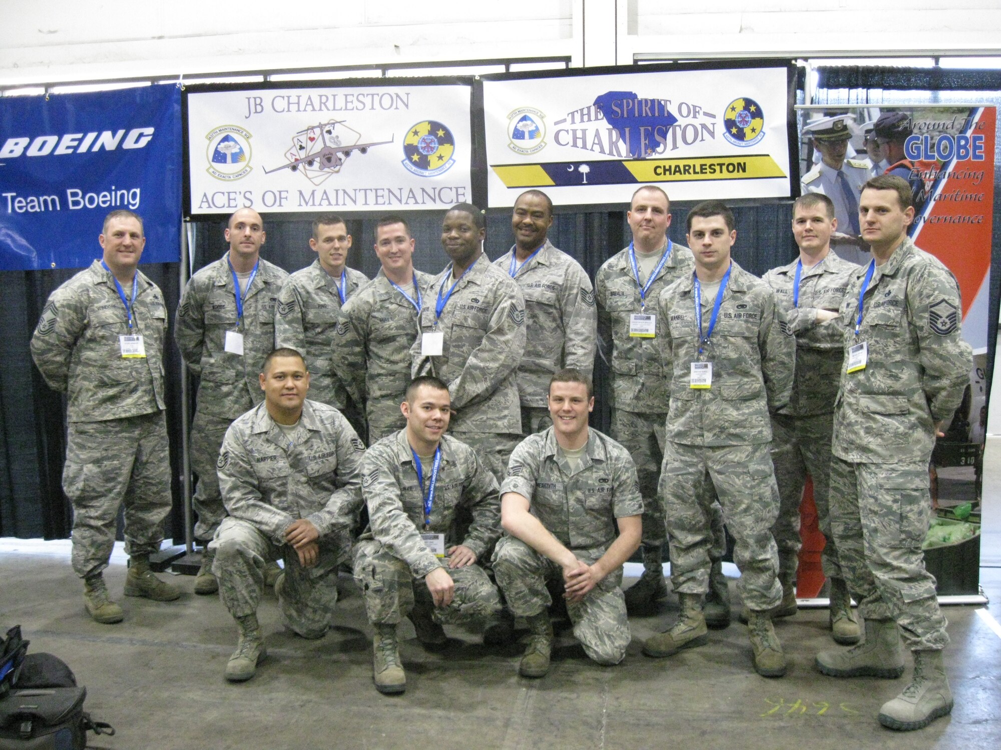 Airmen from the 437th Maintenance Group at Joint Base Charleston - Air Base pose in front of their two teams’ banners during the Aircraft Maintenance Technology Skills Competition March 7 through 9 in Las Vegas. The two JB Charleston teams competed against 135 other competitors in 16 different events spanning five different categories. Team 1, “Ace’s of Maintenance,” placed third overall in the military portion of the competition. (Courtesy photo)