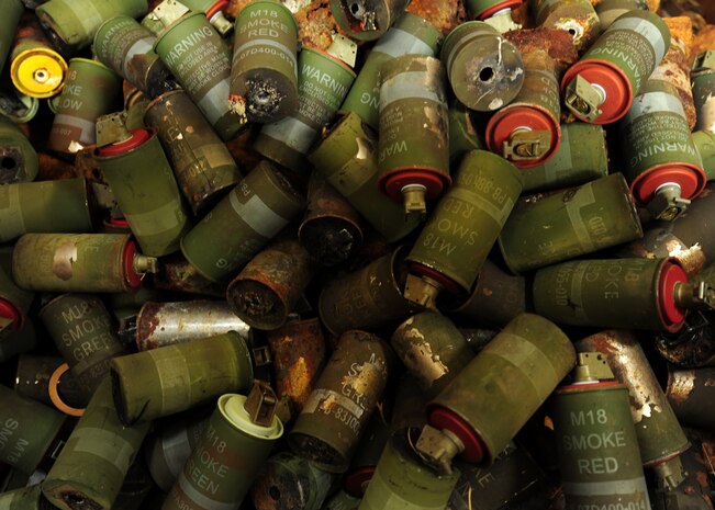 Empty grenade casings sit in a box waiting to be properly disposed at the munitions center on Joint Base Charleston - Air Base April 10. The 437th Maintenance Group munitions shop on JB Charleston is responsible for small arms munitions, flares, detonation cord, as well as explosive munitions for the 628th Civil Engineer Explosive Ordinance Dispoal shop. (U.S. Air Force photo/Staff Sgt. Katie Gieratz) (Released)