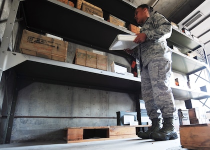 Senior Airman Caprice Frazier takes inventory at Joint Base Charleston - Air Base Munitions Center April 10. The 437th Maintenance Group Munitions office is responsible for more than $15 million dollars worth of munitions. Frazier is a munitions accountability technician with the 437th MXG. (U.S. Air Force photo/Staff Sgt. Katie Gieratz)