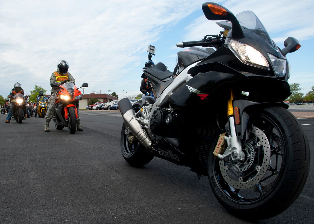 An Aprillia RSV-4 sits in the lead road captain spot at the start of the Sexual Assault Prevention Response Awareness Month Road Rally ride April 6 at the Langley Air Force Base, Va., Community Activity Center. In keeping with the mantra of “safety first,” each motorcycle was inspected for possible safety hazards prior to the ride. (U.S. Air Force photo by Senior Airman John D. Strong II/Released)