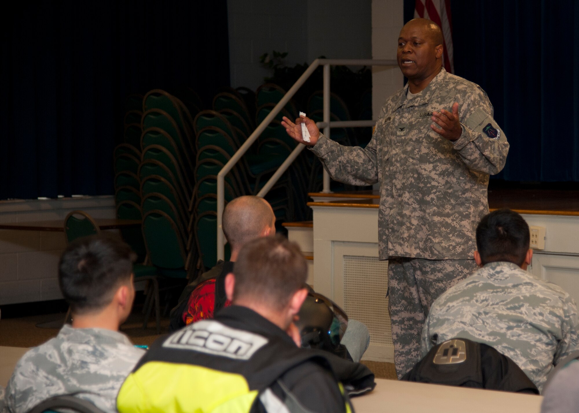 U.S. Army Col. Reggie Austin, 633rd Air Base Wing vice commander, speaks to motorcycle riders before the Sexual Assault Prevention Response Awareness Month road rally April 6 at the Langley Air Force Base, Va., Community Activity Center. The rally was held to raise awareness about sexual assault prevention. (U.S. Air Force photo by Senior Airman John D. Strong II/Released)