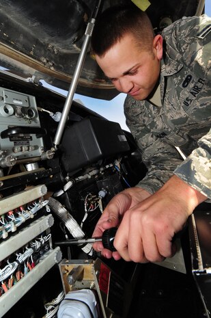 U.S. Air Force Airman 1st Class Ryan Wilkerson, 763rd Maintenance Squadron avionics guidance and control journeyman, installs a terminal board on an HH-60 Pave Hawk helicopter April 5, 2012 at Nellis Air Force Base, Nev.  The 763rd Maintenance Squadron maintains, services, and inspects HH-60G Pave Hawk aircraft.  (U.S. Air Force photo by Staff Sgt. William P.Coleman)
  

